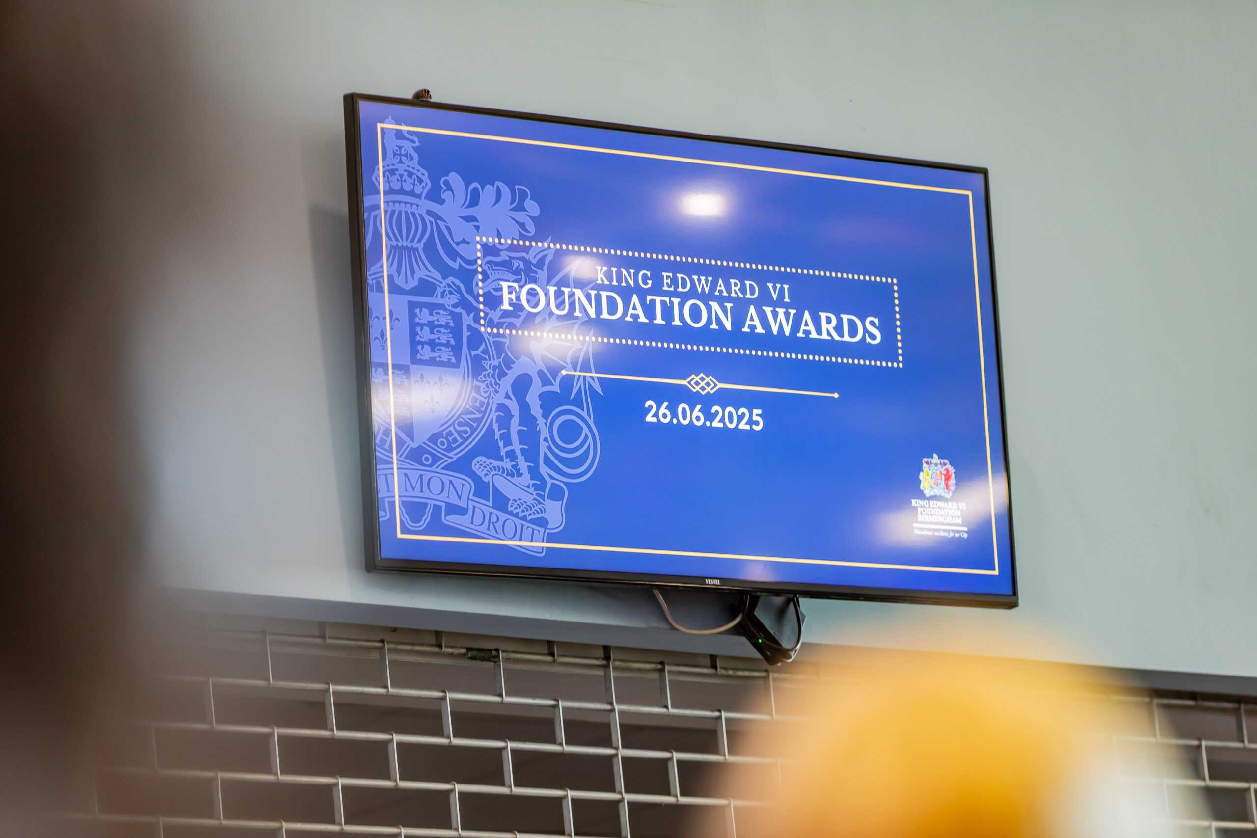 The King Edward VI Foundation Awards 2025 on a digital screen